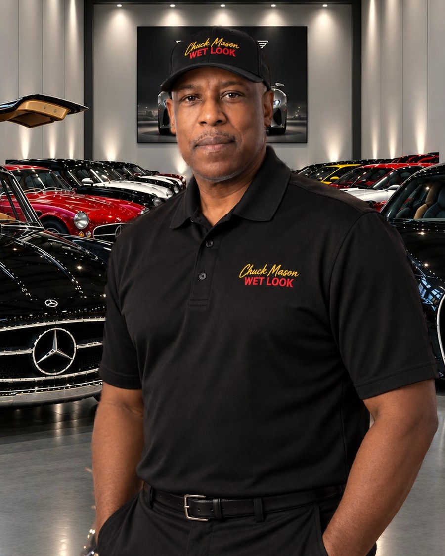 Chuck Mason in a showroom of polished collector cars