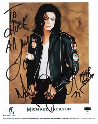 Signed photograph inscribed to Chuck Mason by Michael Jackson