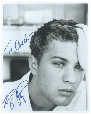 Signed photograph inscribed to Chuck Mason by Ryan Phillippe
